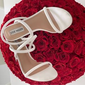 Steve Madden white high heel sandal.